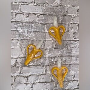 3 silicone banana-shaped baby teether and training toothbrush